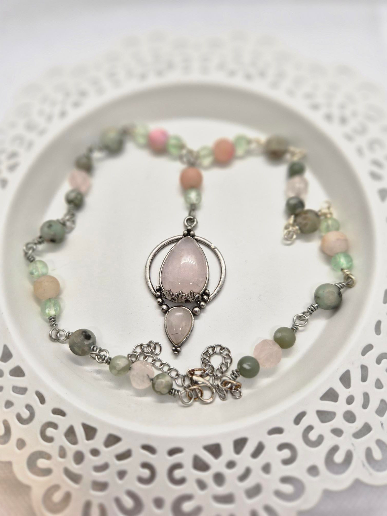 Rose quartz pendant on beaded necklace