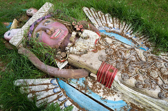 Wooden Angel in the grass at Dumfries