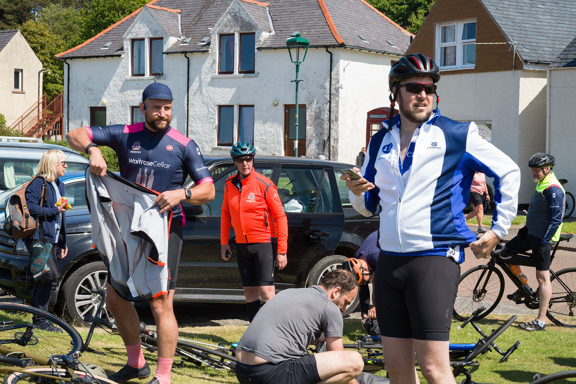 Cyclist at a rest stop stocking up on Jelly Babies
