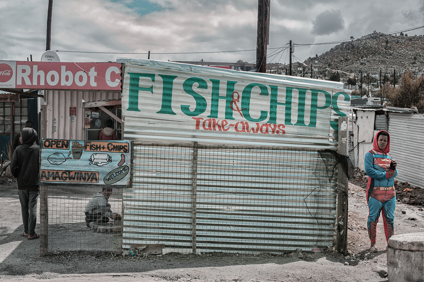 Superwoman fine art photograph by Mike Rossi — informal settlement in colour