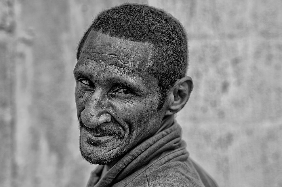 Unemployed Man - from the INHERITANCE in black & white series of photographs by Mike Rossi