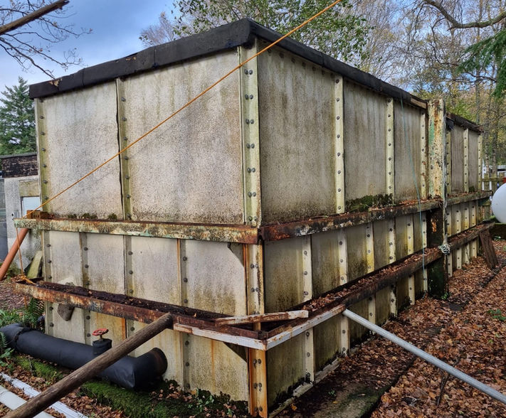 Dilapidated water tank.