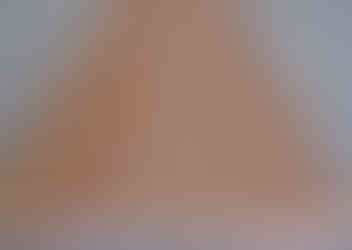 Close-up of a light brown wood grain, Rustic Teak Base. Diamond Tropical Hardwoods.