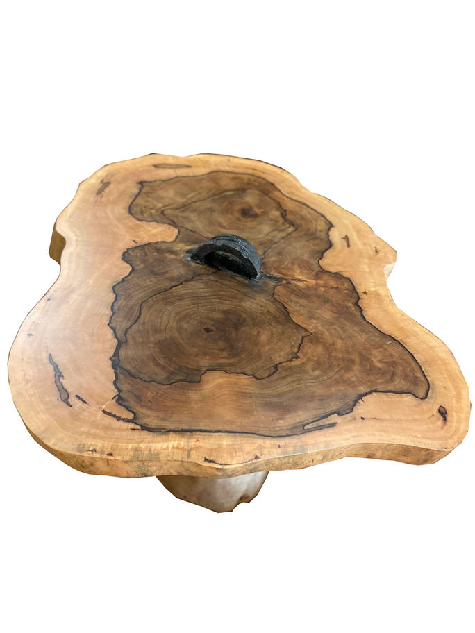 Wooden stool with a unique shape Sanded Stool T3047 and Diamond Tropical Hardwoods.