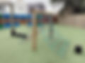 Outdoor climbing frame play structure inspected for safety compliance