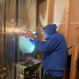 Jamey cutting metal