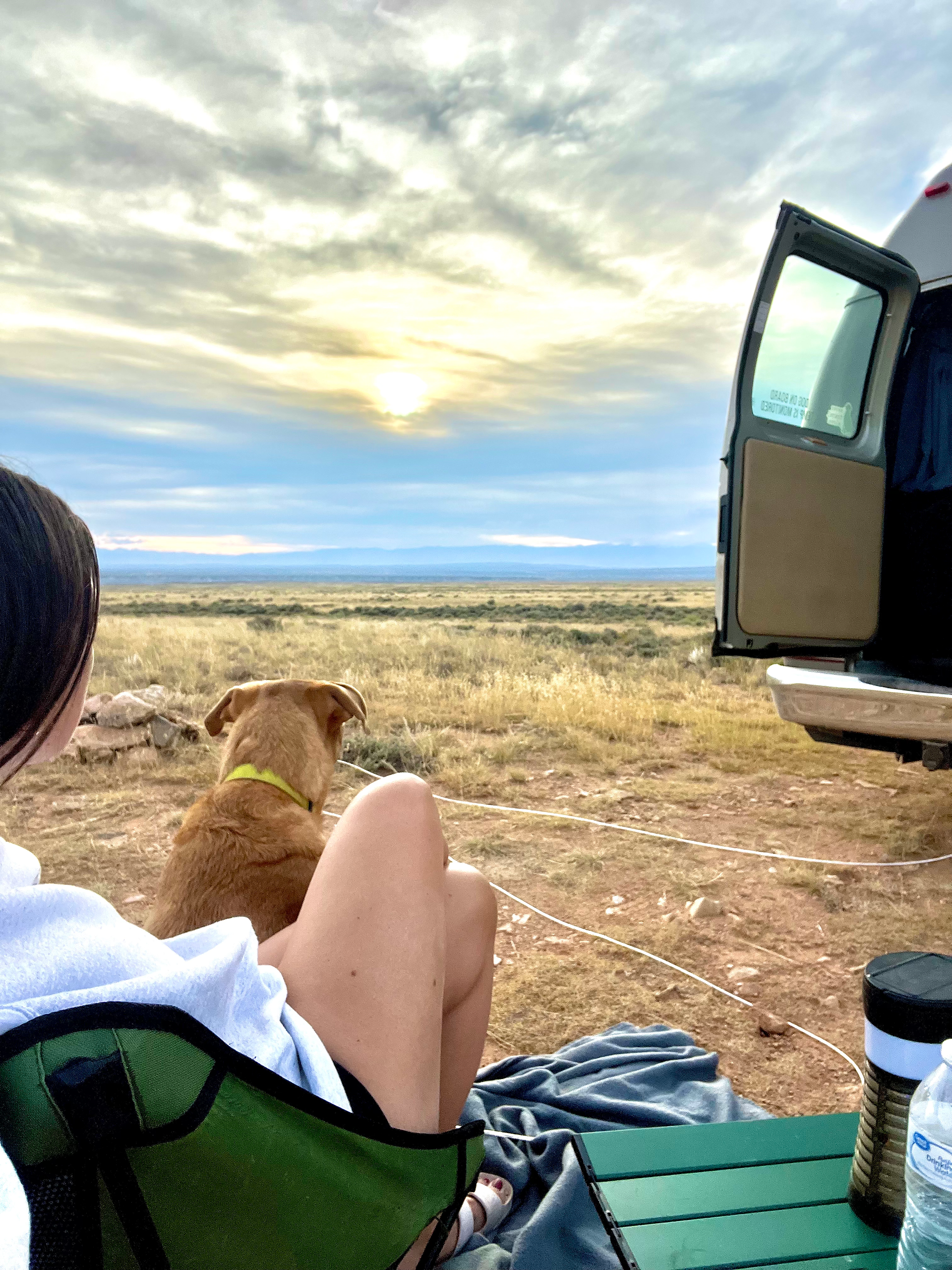 girl and dog dispersed RV camping in Montana