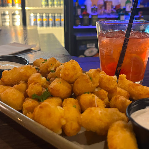 deep fried cheese curds and cocktail at second salem brewing in whitewater wisconsin