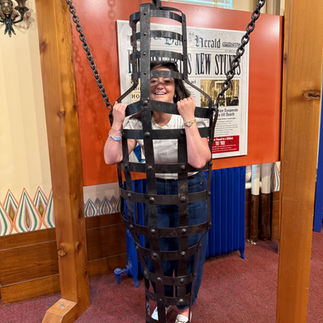 girl in houdini exhibit history museum at the castle