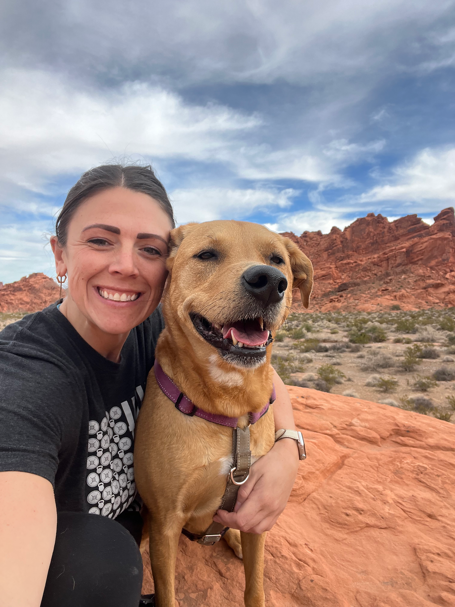 woman and dog at valley of the fire state park
