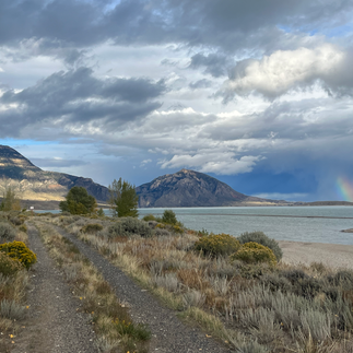 rainbow over mountains in cody wyoming