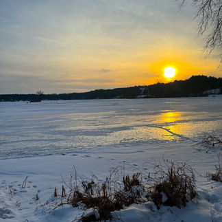 sunset on rice lake in winter in whitewater wisconsin