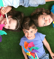Kids With Pinwheels