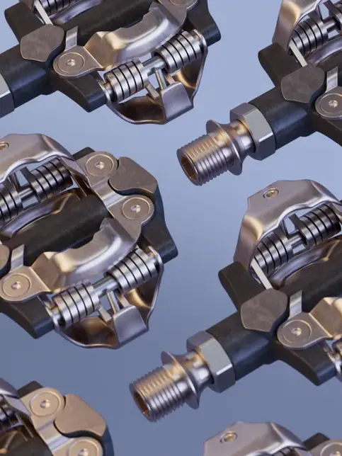 3D render of Rondo Ruut CF2 bike pedals arranged in a seamless pattern against a light blue background, showcasing detailed mechanical parts and springs.