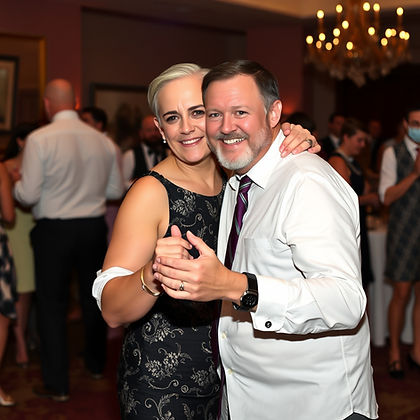 two people dancing at a dinner event .jpg