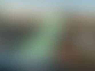 A drone scans a construction site with green digital mapping. Graphs and data overlays are visible. City skyline in the background.