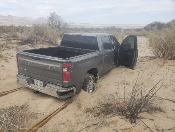 truck stuck in the sand