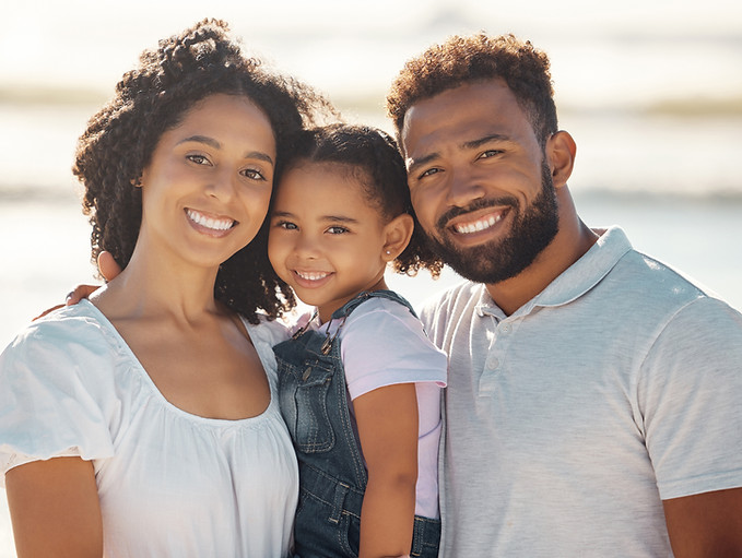 portrait-family-beach-travel-girl-smile-holiday-spain-with-parents-walking-by-ocean-happy-