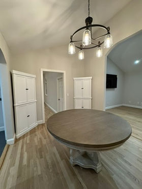 Dining room with new doors, trim and flooring from a New Jersey home renovation