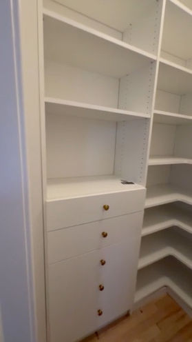 Built-in window bench with custom shelving from a New Jersey interior carpentry project