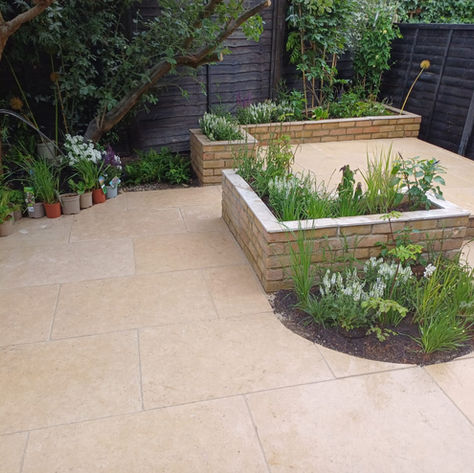 "Stuart Savage Balham Courtyard masonry and joinery.