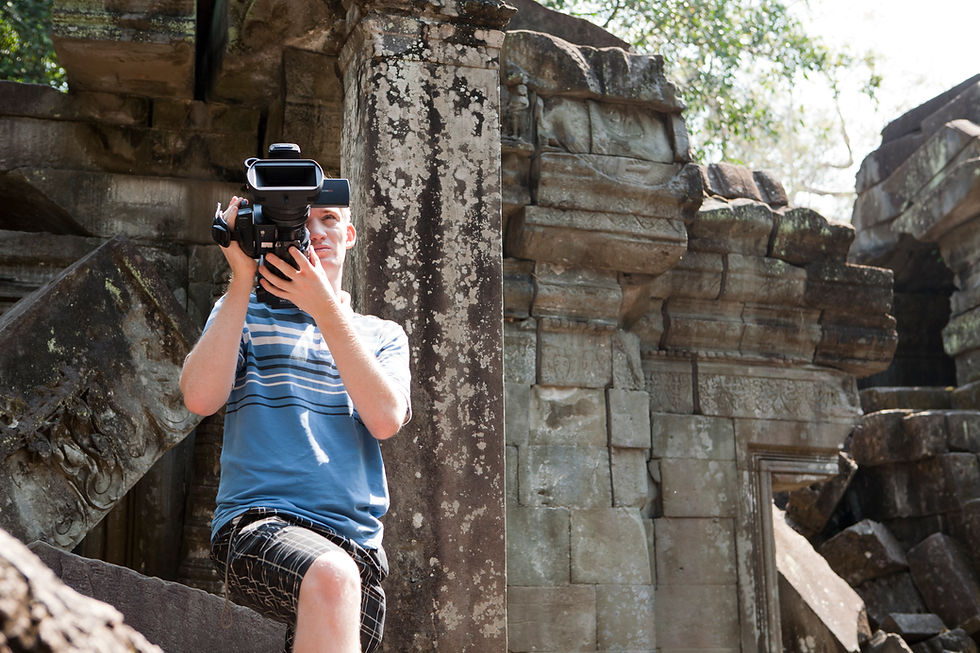 Robin Waldman filming at Angkor Wat temple complex in Cambodia