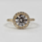 14K yellow gold halo ring with a 1.50-carat D color VVS1 lab-grown center diamond, 0.34 carats of D-F VVS1 side stones