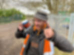 chris holding and looking at mug