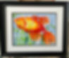 Bright goldfish swimming in reeds
