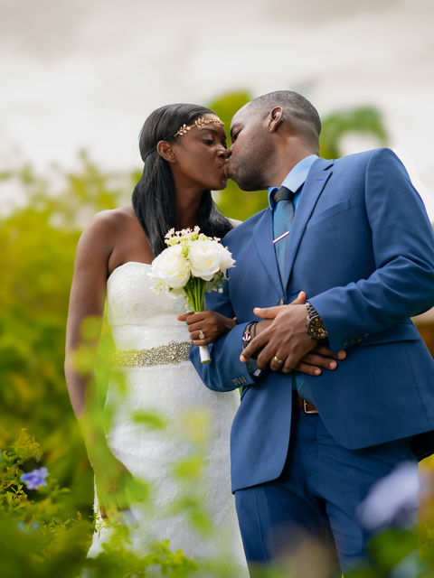 Jamaican Wedding PhotoA beautiful Jamaican wedding photo of a bride and groom at Hope Gardens in Kingston Jamaica
