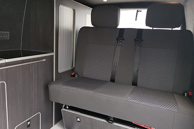 Smart beds are popular choice for many camper van conversions. Smart beds are equipped with a range of market leading features including an ease of use operating system, reclining mechanism, EVOLUX upholstery and spacious under bed storage. Smart beds are also available on a rail system, giving the bed the ability to move up and down the length of the van, creating additional storage space.