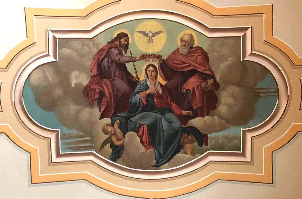 A copy of The Coronation of the Virgin by Diego Velazquez, pictured on the ceiling of Sts. Peter and Paul Church