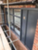 New aluminium windows and colorcoat cladding in external facade of a stockport apartment conversion.
