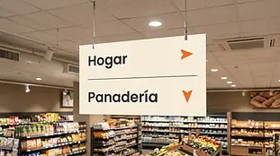 Aplicación de la identidad visual en un supermercado Alado de Madrid
