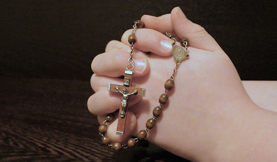 Hands Holding Rosary