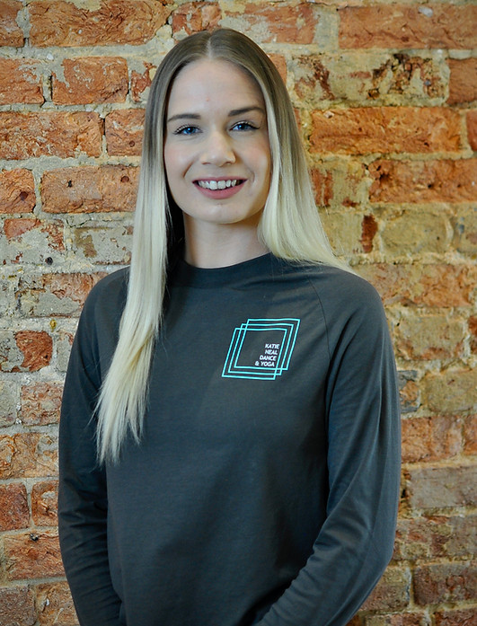 Photo of white woman with long blonde hair and blue eyes