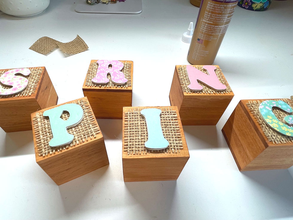 Glue the letters on the burlap.