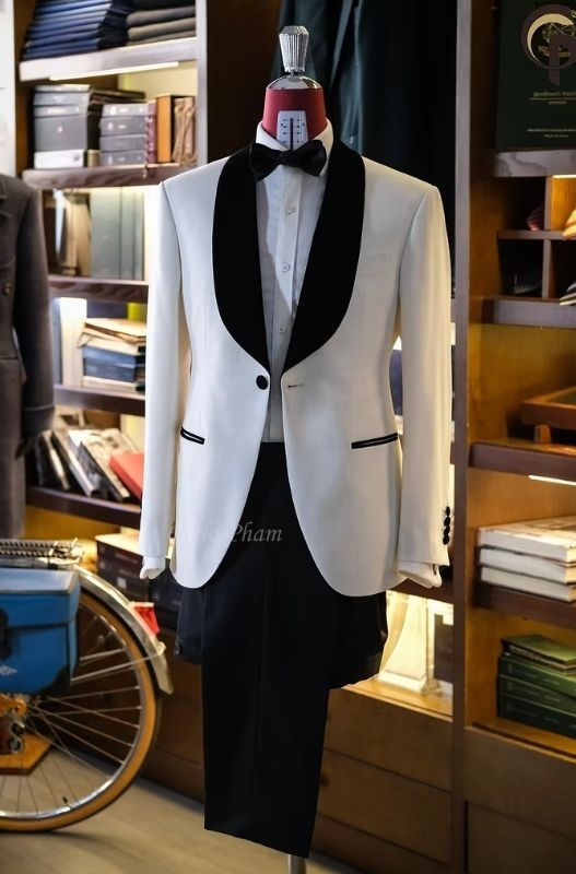 Pair a tuxedo with a white shirt and a black bow tie.