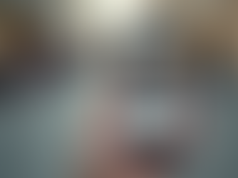 Smartphone displaying Two Four Media website on mobile screen, illustrating the importance of mobile-friendly websites for local SEO and user experience.