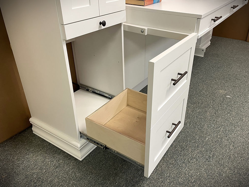 A shredder drawer pulled out in a custom Murphy bed