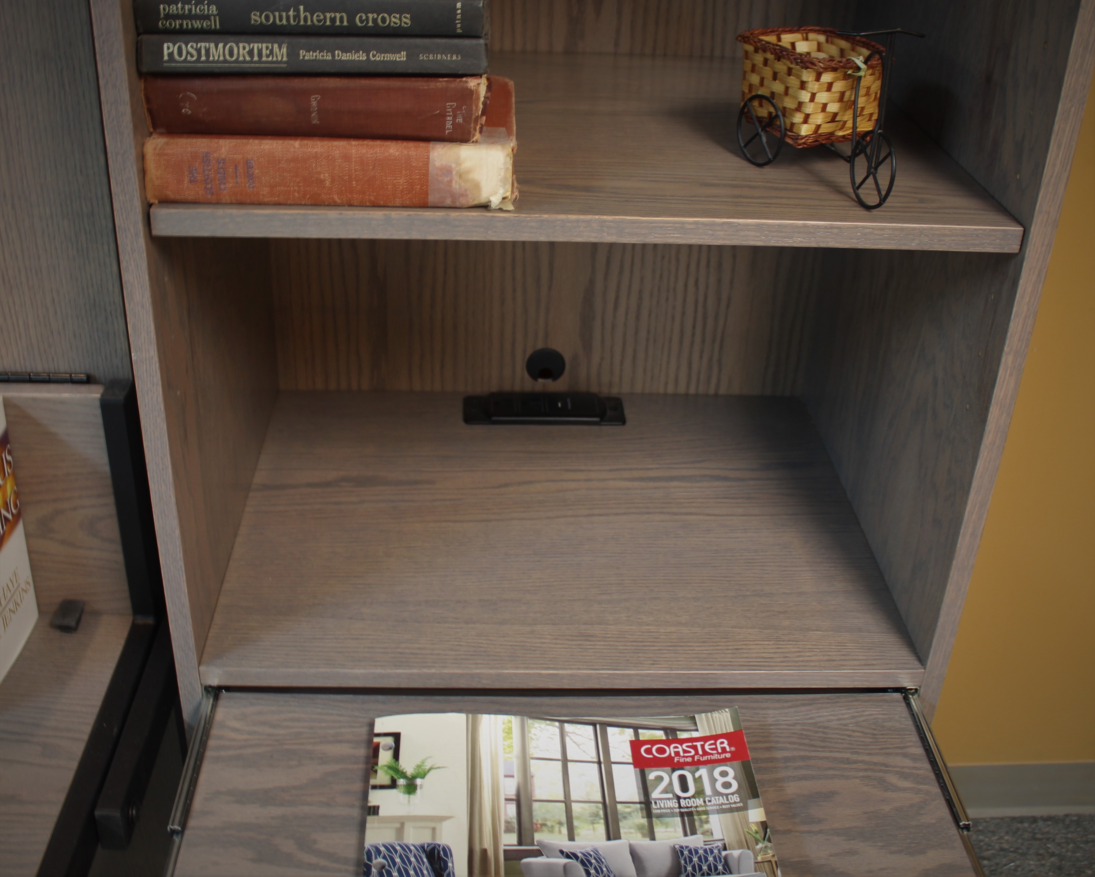 Charging station in back of bookcase