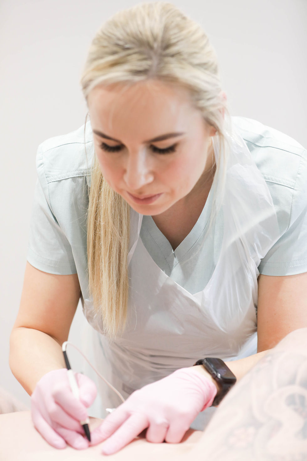 Jodie of JEMS Health & Beauty carrying out Eletrolsys treatment