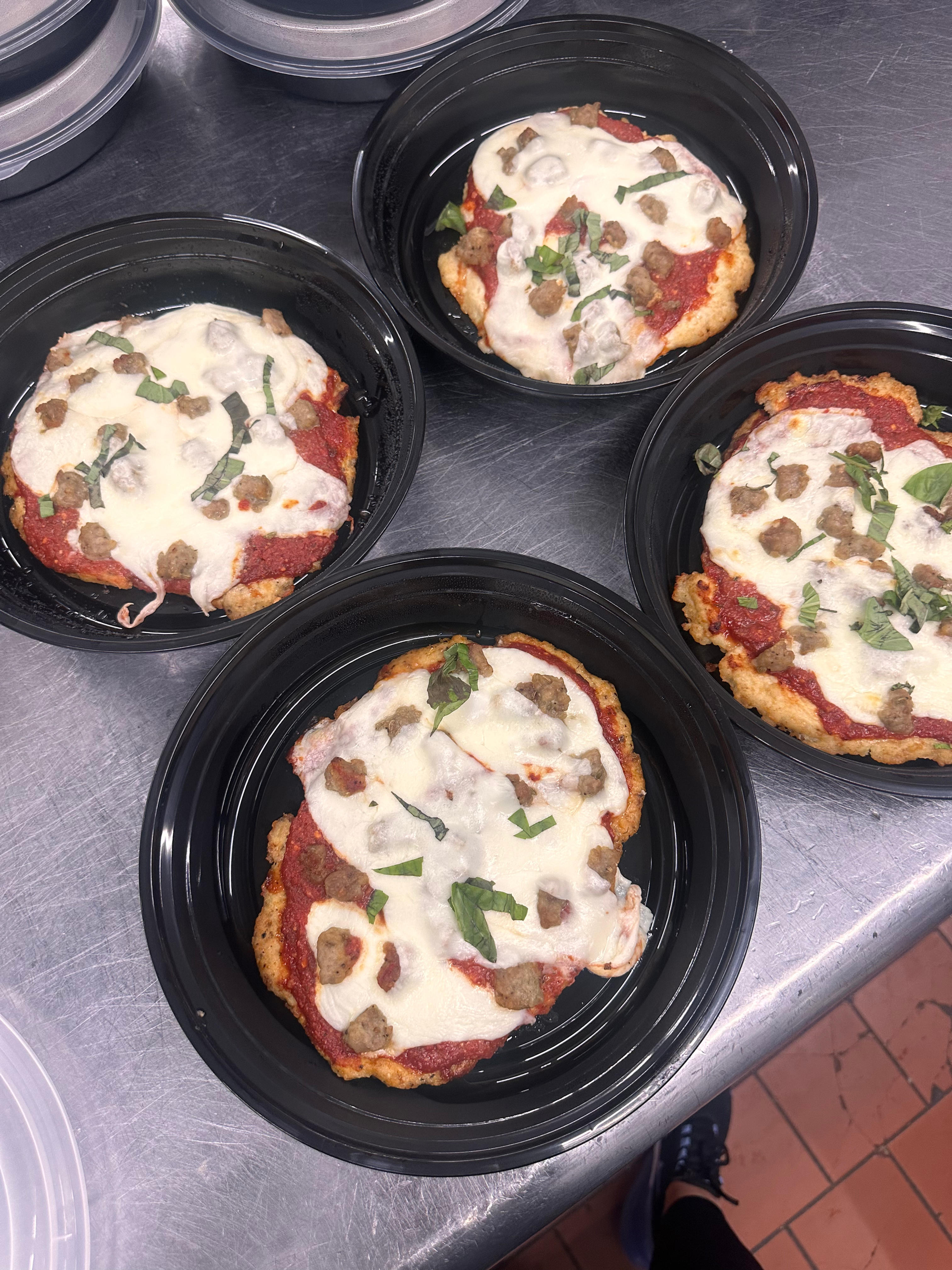 Chicken crusted margherita pizza with homemade crumbled sausage