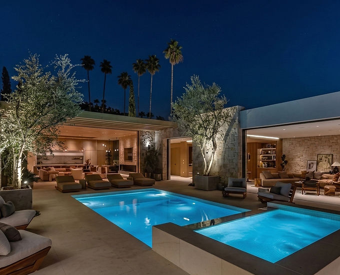 The Flats Beverly Hills outdoor pool and patio at night ā Vantage lighting control and Control4 automation by HTS Systems