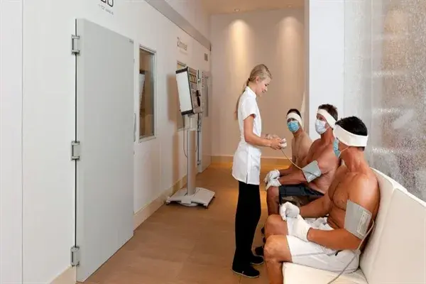People preparing to enter a cryo chamber