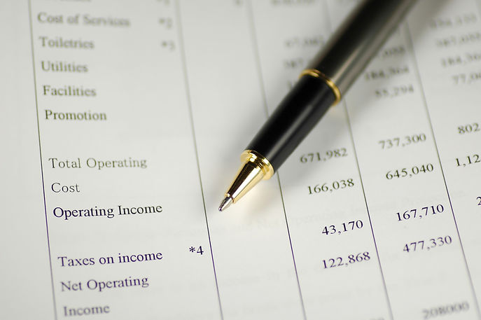 Pen on Income Statement.jpg