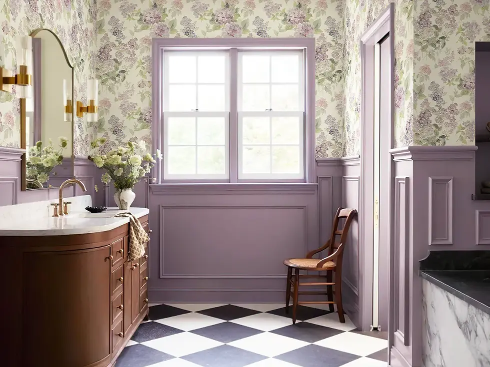 Bold floral wallpaper paired with neutral paint in modern living room