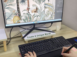 Designer creating custom tropical wallpaper pattern on a computer – RunpWell OEM/ODM wallpaper design for fast market launch