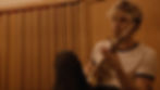 Luke Hemmings playing guitar while writing his album 'When Facing The Things We Turn Away From'.