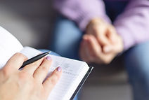 stock-photo-psychotherapy-session-woman-talking-her-psychologist-cozy-office-psychotherapy